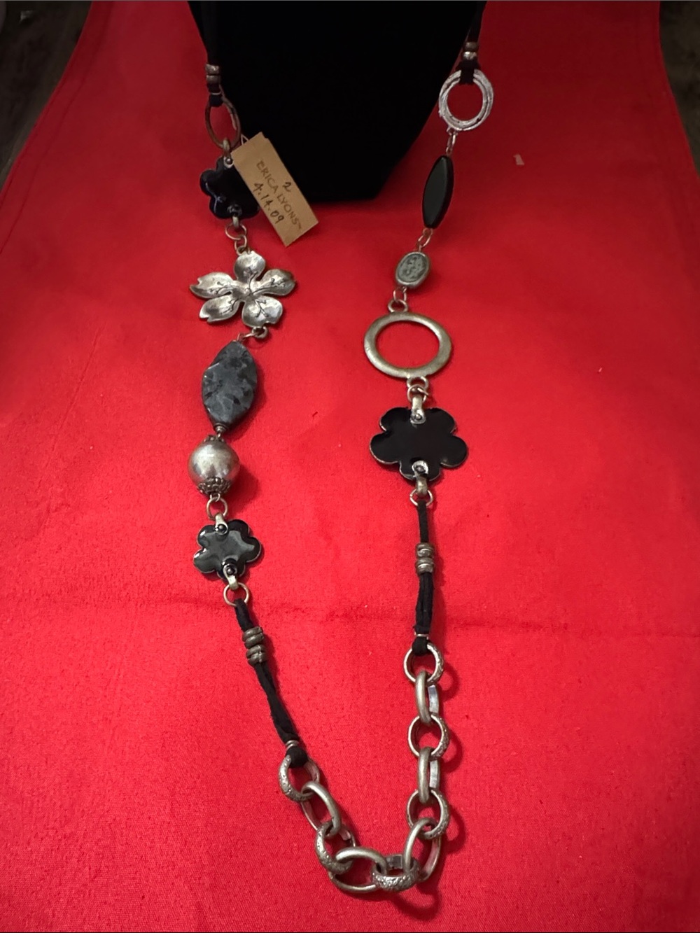 Erica Lyons Black and Silver Floral Necklace 21” long leather string